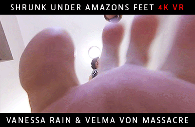 SHOT WITH OUR ALL NEW 4K VIRTUAL REALITY CAMERA! HIGHER QUALITY HOWEVER NOT FULL 360!

You've been shrunken under the feet of two of the tallest women you know! Vanessa towered over you at 6'3 and Velma at 6ft in real life, now you are only an inch tall as the two HUGE woman loom over your tiny body with their massive feet! Vanessa's size 12's and Velma's size 11's are so big you can't believe it! They threaten to crush you if you don't sniff and worship their feet at your new size. The walk around and over you as you are frozen to the spot. One false move and your life will be ended under their giant feet! You're in a bad spot and there's no escaping these amazons!