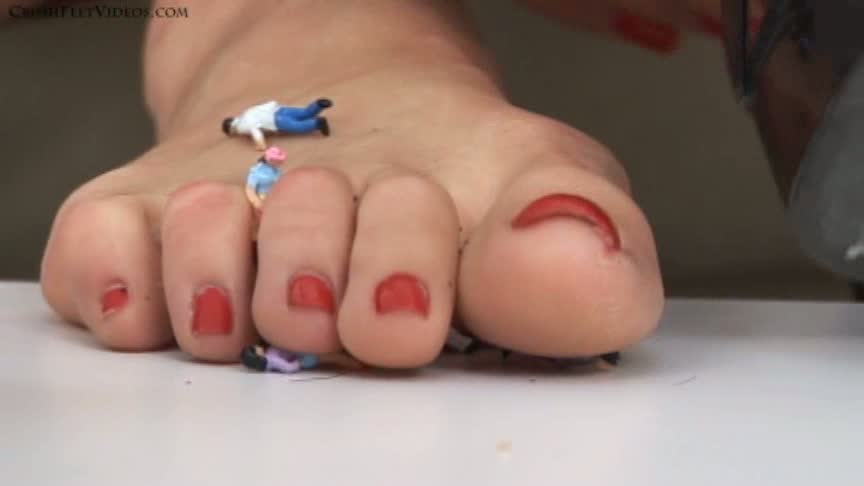 <p>Tara has shrunken people inside of a box. She proceeds to take them and use them as toe separators in order to paint her toenails. After she's done she crushes them and lounges back in the couch.</p>