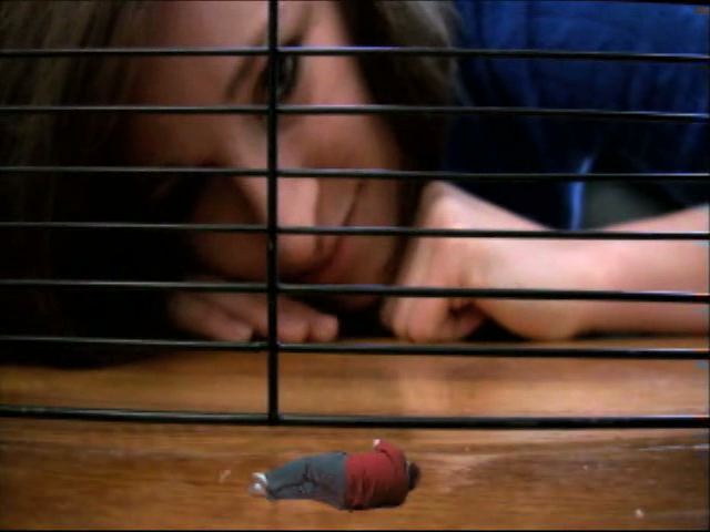 <p>After Gretchen finishes stomping the tiny men in her new apartment, she finds one last guy and decides to lock him in a cage. The next day, she puts the guy in the back pocket of her jeans, and accidentally squishes him when she sits down! So she eats his remains.</p>