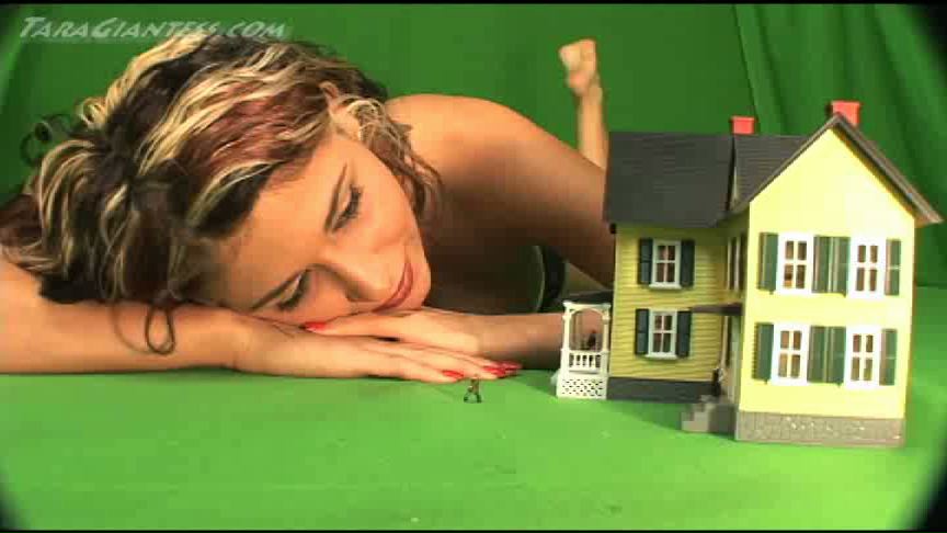 <p>Tara has a shrunken house full of tiny people and she puts some in her cleavage. then she plays with them with her feet and hands and finally she puts more of them in her cleavage.</p>